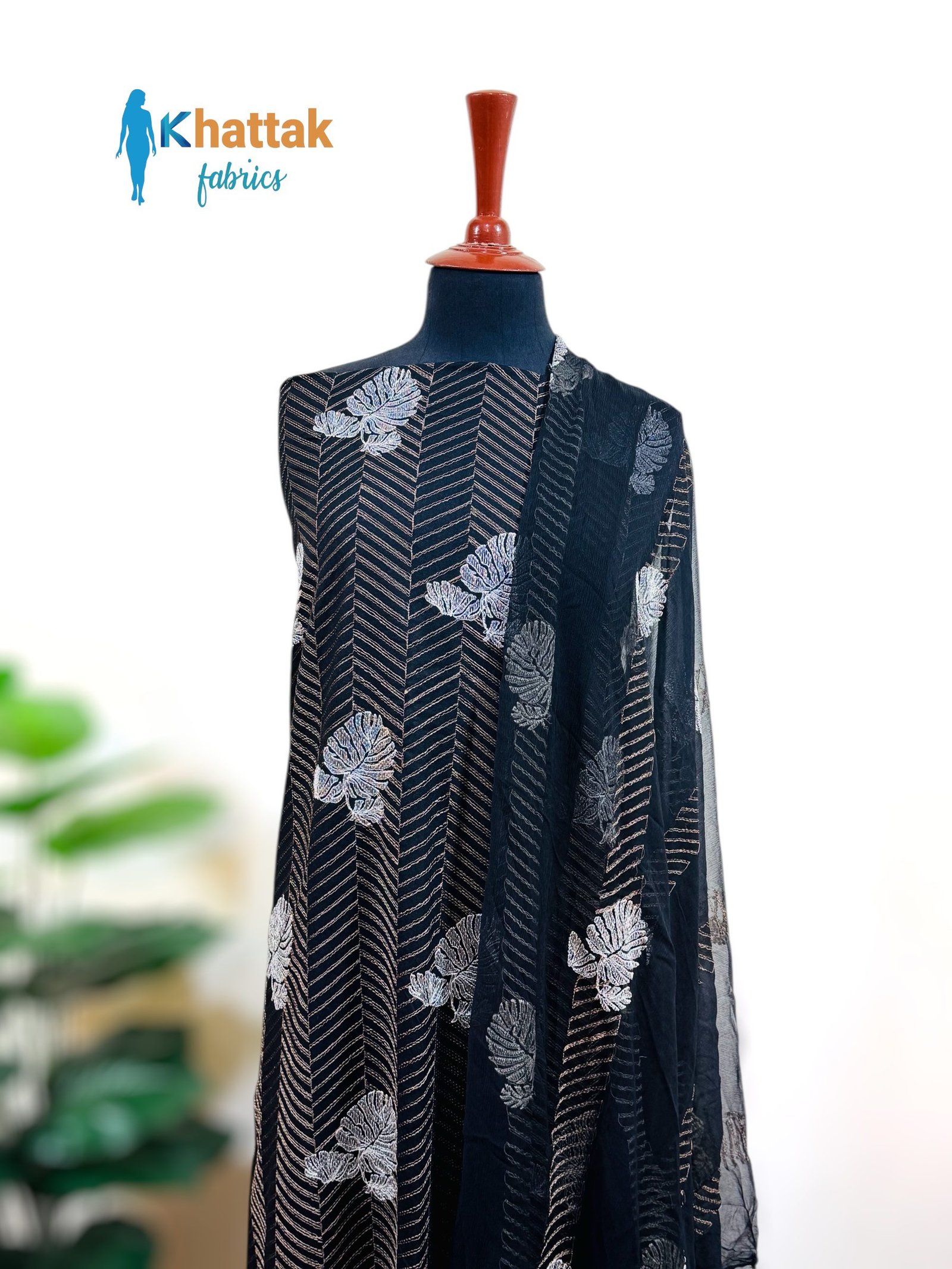 Black Karandi Embroidered Suit on Mannequin Black Karandi Embroidered 3 Piece Suit Front View – Khattak Fabrics