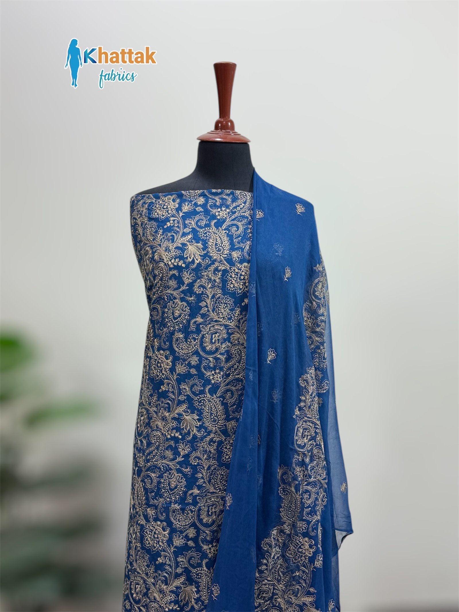 3PC Royal Blue Karandi Suit with Pure Crinkle Chiffon Dupatta 3PC royal blue karandi printed shirt with antique gold design, pure crinkle chiffon dupatta and plain trouser
